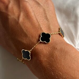 Black charm bracelet